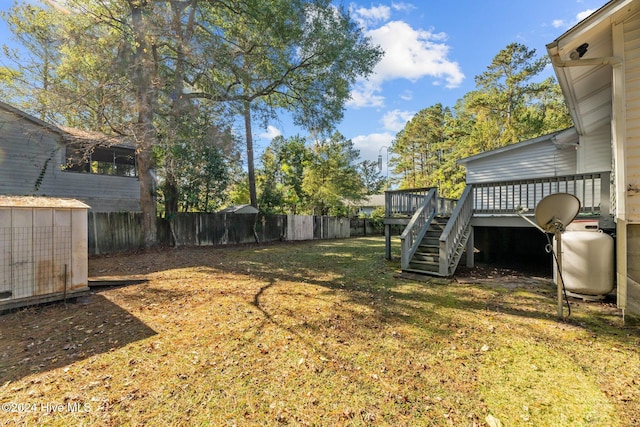 view of yard featuring a deck