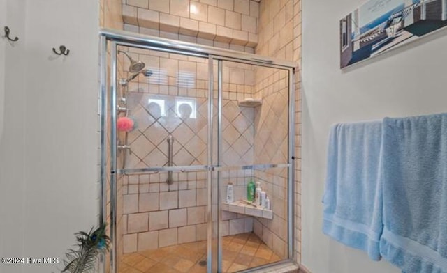 bathroom featuring walk in shower