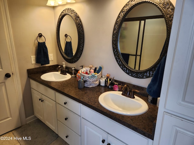 bathroom featuring vanity and tile patterned floors