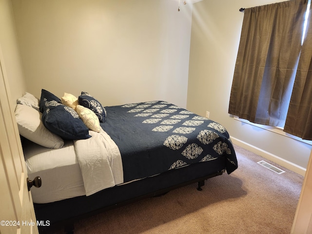 bedroom featuring carpet flooring