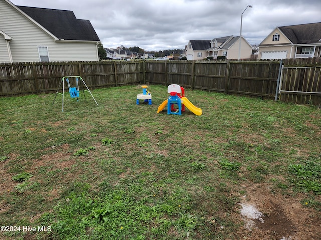 view of yard featuring a playground