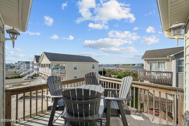 deck featuring a water view