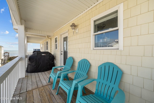 wooden terrace with grilling area