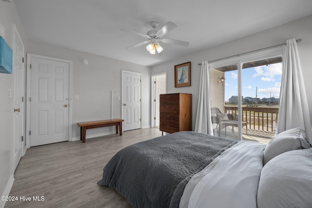 bedroom with access to outside, ceiling fan, and light hardwood / wood-style flooring