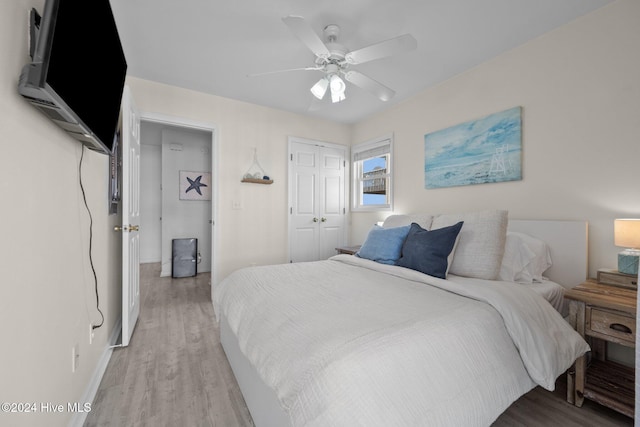 bedroom featuring ceiling fan and light wood-type flooring