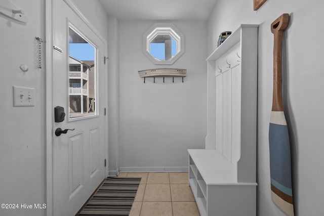 mudroom with light tile patterned floors