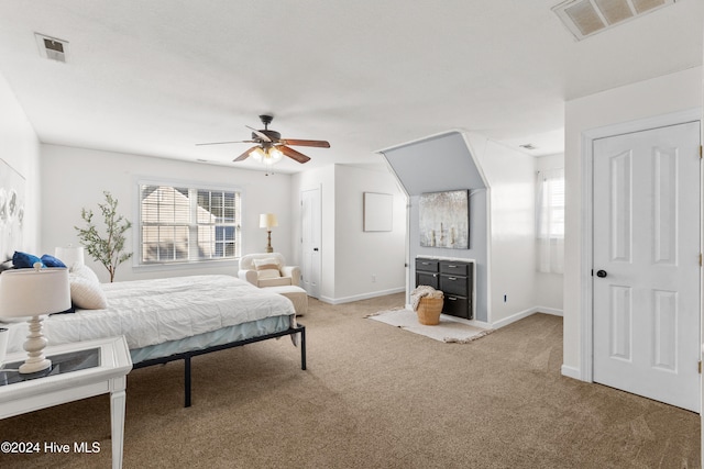 carpeted bedroom with ceiling fan