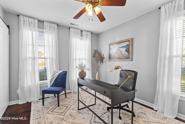 office area featuring ceiling fan and light wood-type flooring