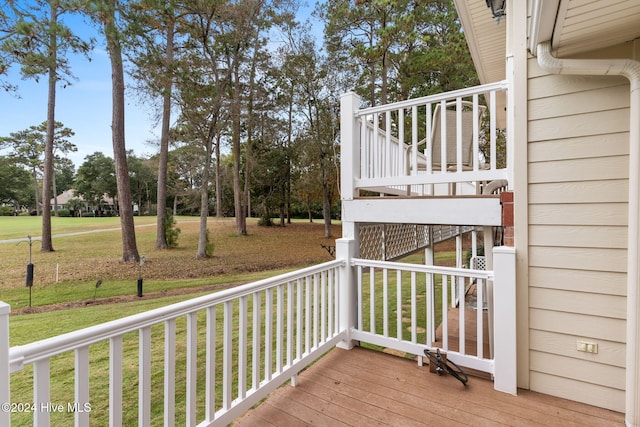 deck featuring a lawn