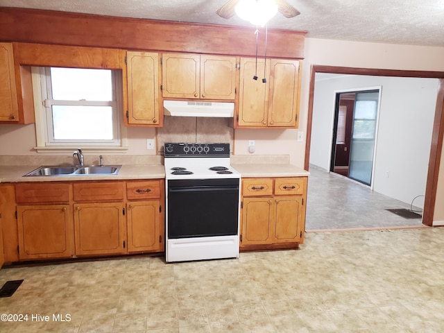 kitchen featuring ceiling fan, sink, a textured ceiling, and white electric range