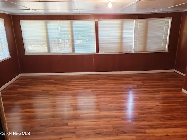 spare room featuring hardwood / wood-style floors