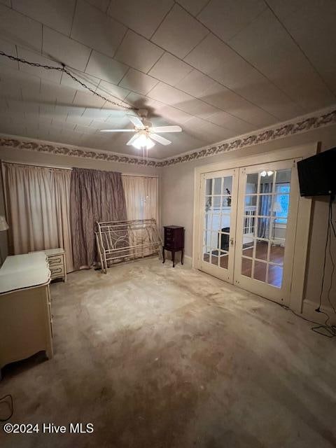 miscellaneous room with french doors and ceiling fan