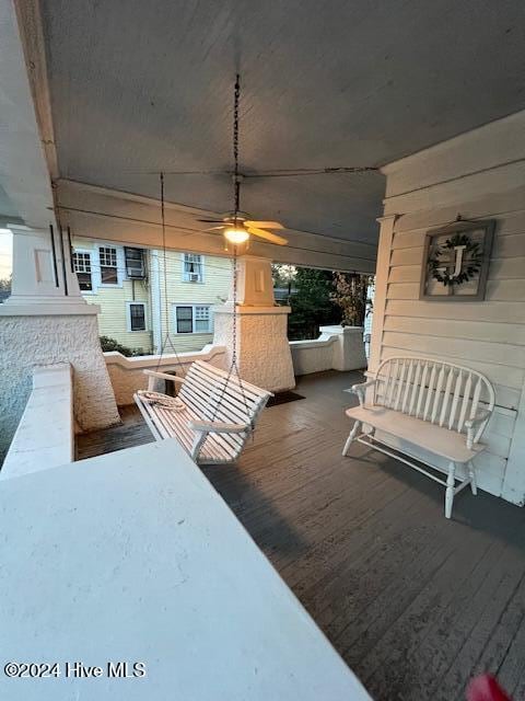 exterior space featuring a porch and ceiling fan