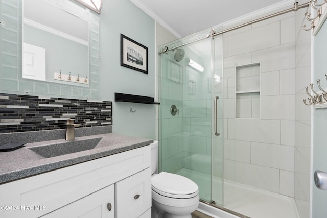 bathroom featuring tasteful backsplash, vanity, ornamental molding, and walk in shower