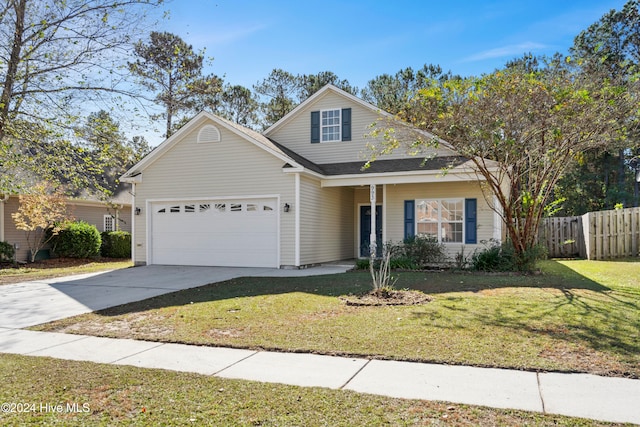 view of front property with a garage and a front lawn