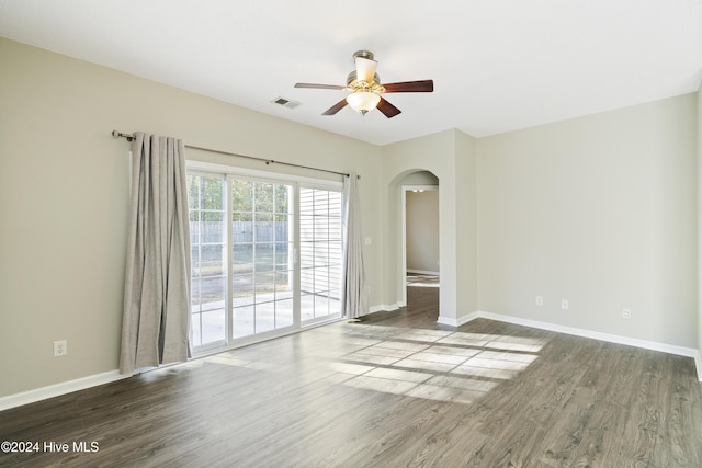 spare room featuring ceiling fan and hardwood / wood-style flooring