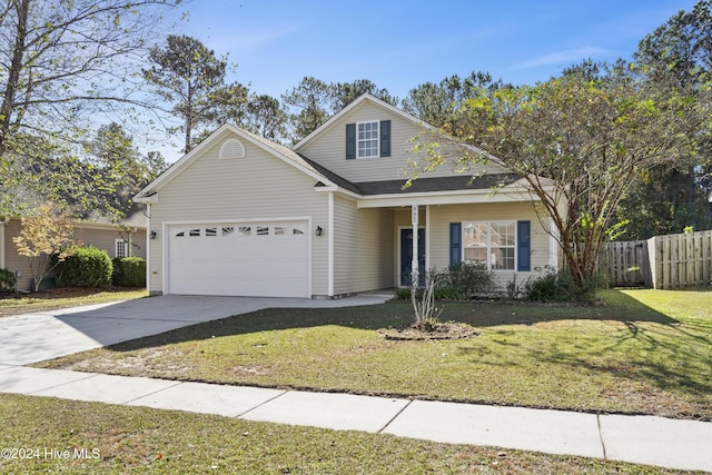 front of property featuring a garage and a front lawn