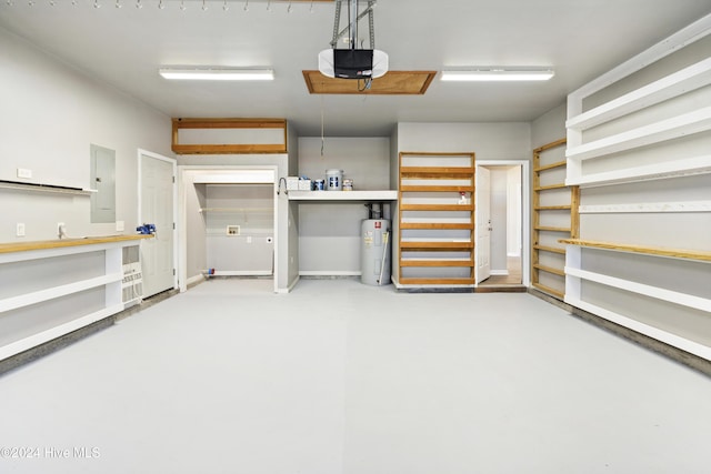 garage featuring electric water heater, electric panel, and a garage door opener