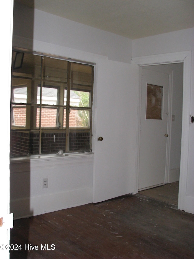 empty room featuring dark hardwood / wood-style floors