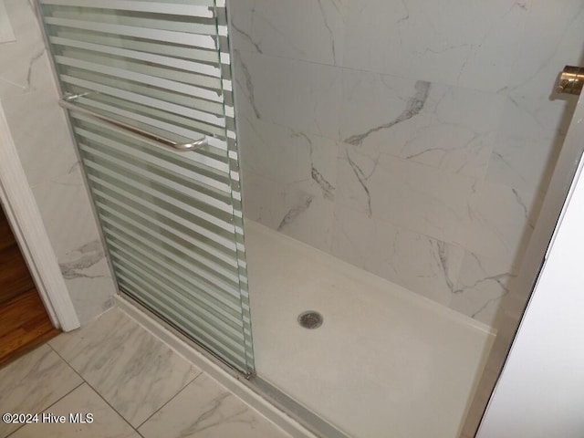 bathroom featuring walk in shower