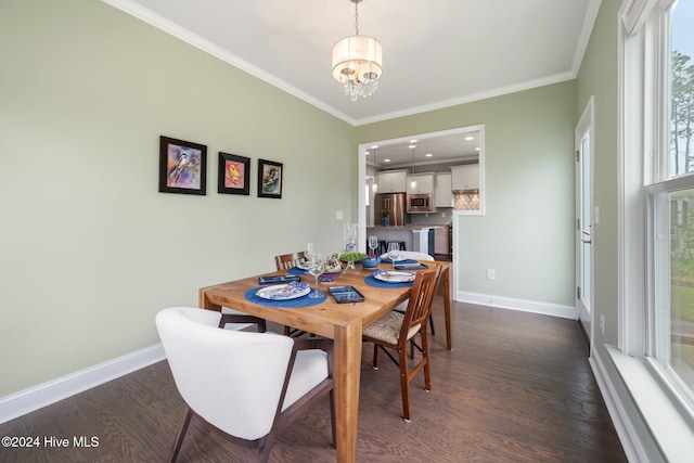 dining room with a chandelier, baseboards, ornamental molding, and dark wood-type flooring