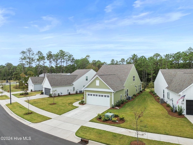 view of front of house with central AC and a front lawn