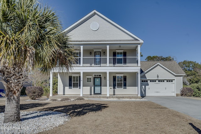 view of front of home featuring a garage and a porch