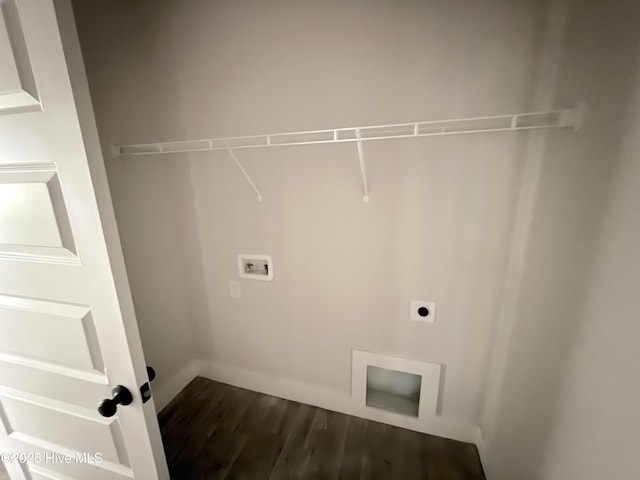 laundry area with electric dryer hookup, dark wood finished floors, washer hookup, and baseboards