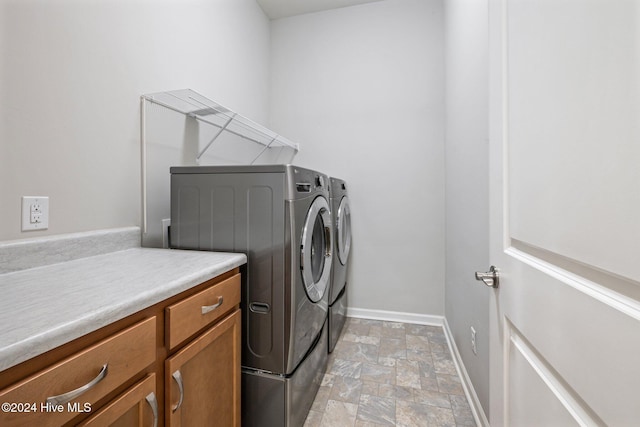 laundry area featuring washing machine and dryer