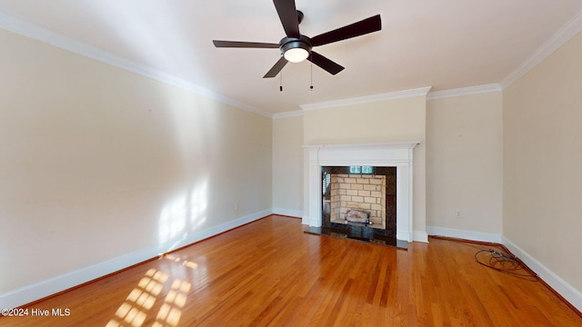 unfurnished living room featuring ceiling fan, wood-type flooring, and ornamental molding