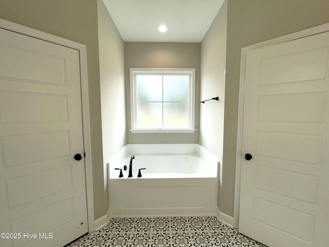 bathroom featuring a bathing tub