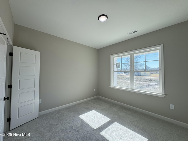 view of carpeted spare room