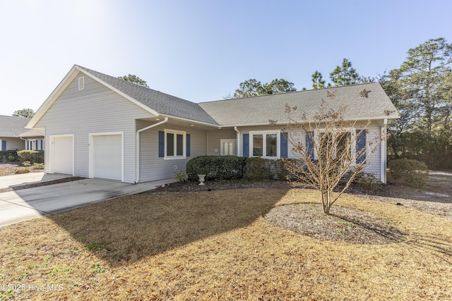 single story home with a garage