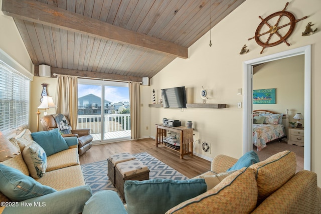 living room with wooden ceiling, vaulted ceiling with beams, light wood-style flooring, and baseboards