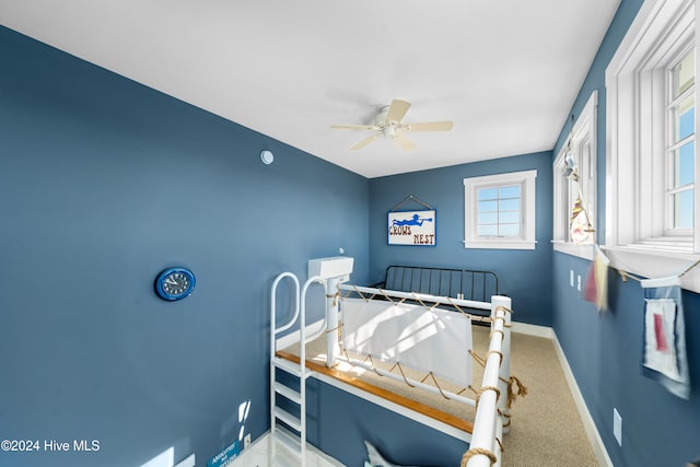 bedroom with carpet flooring and ceiling fan