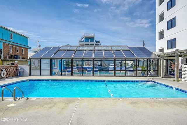 view of pool with a patio area