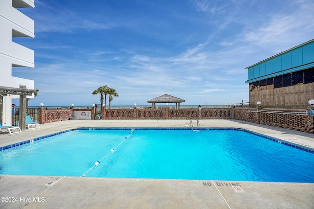 1615 Lake Park Blvd S Unit 1007, Carolina Beach, NC 28428 - community pool featuring a gazebo