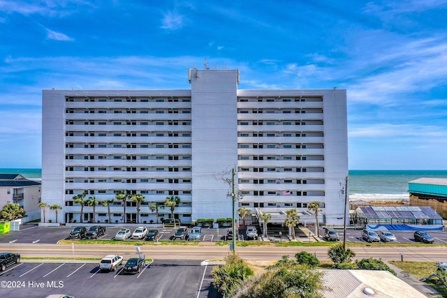 1615 Lake Park Blvd S Unit 1007, Carolina Beach, NC 28428 - view of apartment building / complex with uncovered parking and a water view