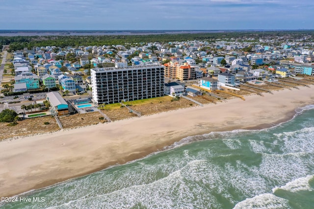 drone / aerial view with a view of the beach and a water view