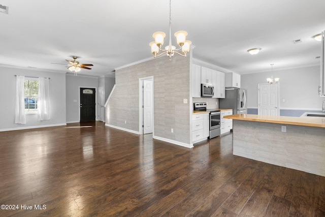 kitchen with white cabinets, appliances with stainless steel finishes, dark hardwood / wood-style flooring, and butcher block countertops