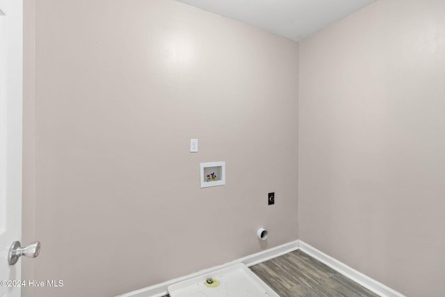 washroom featuring hardwood / wood-style flooring, electric dryer hookup, and hookup for a washing machine