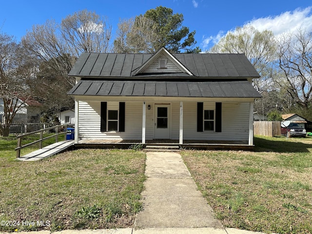 view of front facade with a porch and a front lawn