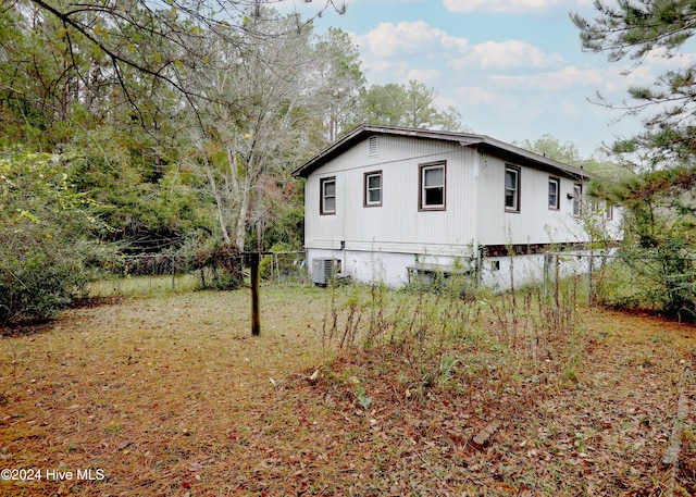 view of home's exterior featuring cooling unit