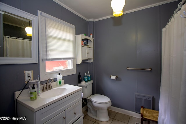 bathroom featuring tile patterned flooring, vanity, toilet, and crown molding