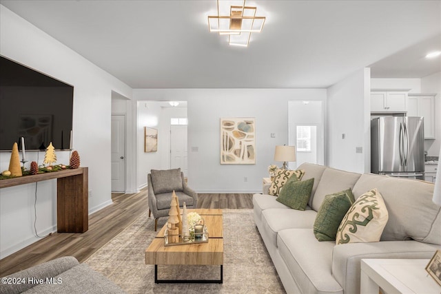 living room with light hardwood / wood-style flooring