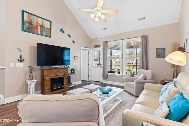 living room with wood-type flooring, high vaulted ceiling, and ceiling fan