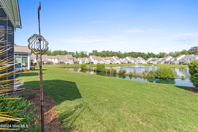 view of yard featuring a water view