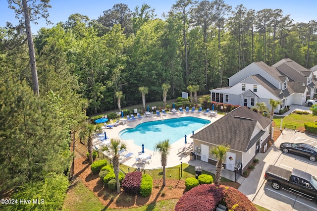 view of swimming pool with a patio area