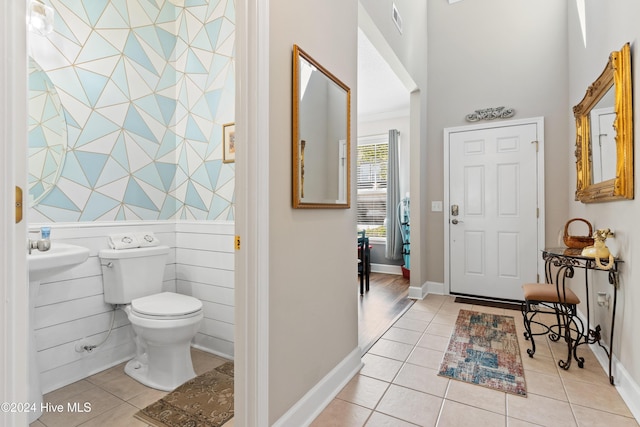 entrance foyer with light tile patterned floors