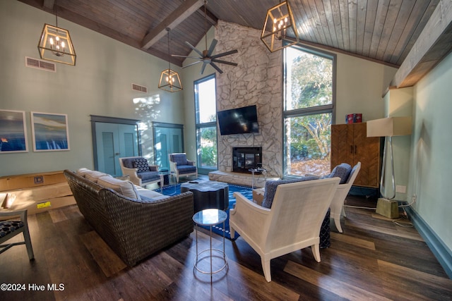 living room featuring dark wood-type flooring, plenty of natural light, high vaulted ceiling, and wood ceiling